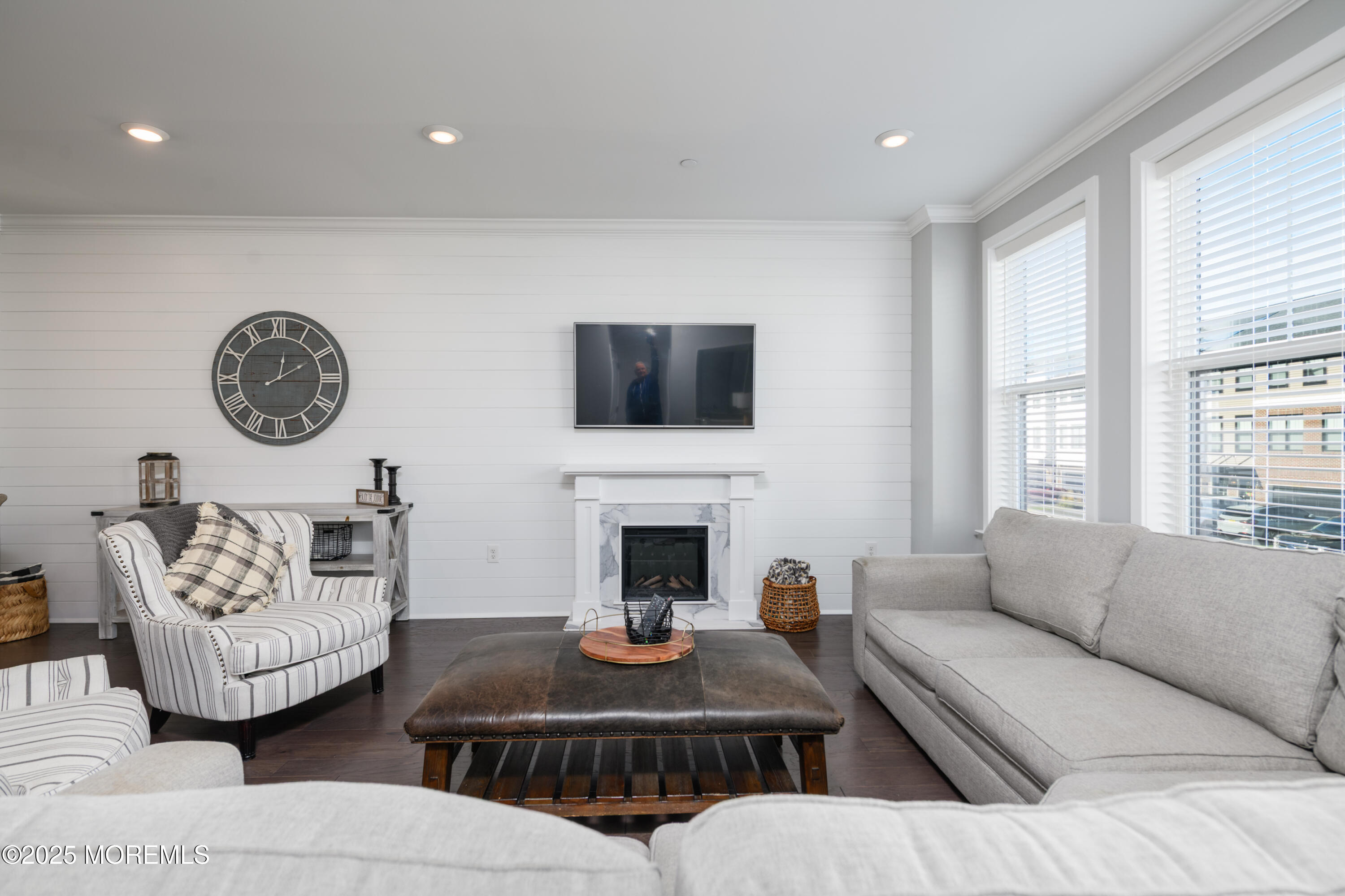 26 Kelly Way Tinton Falls, NJ 07724 - Photo 5 of 33 a living room with furniture a fireplace and a large window