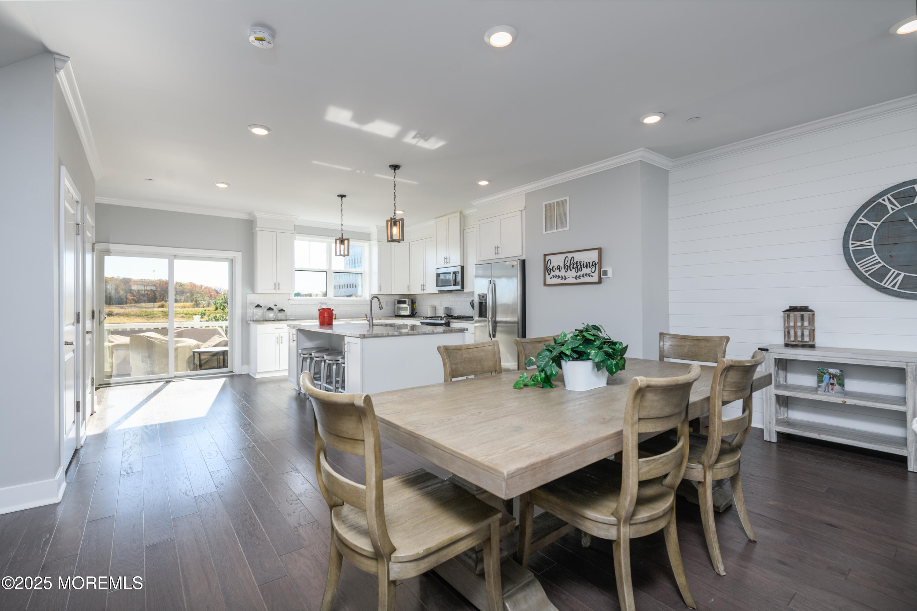26 Kelly Way Tinton Falls, NJ 07724 - Photo 7 of 33 a view of a dining room with furniture and wooden floor