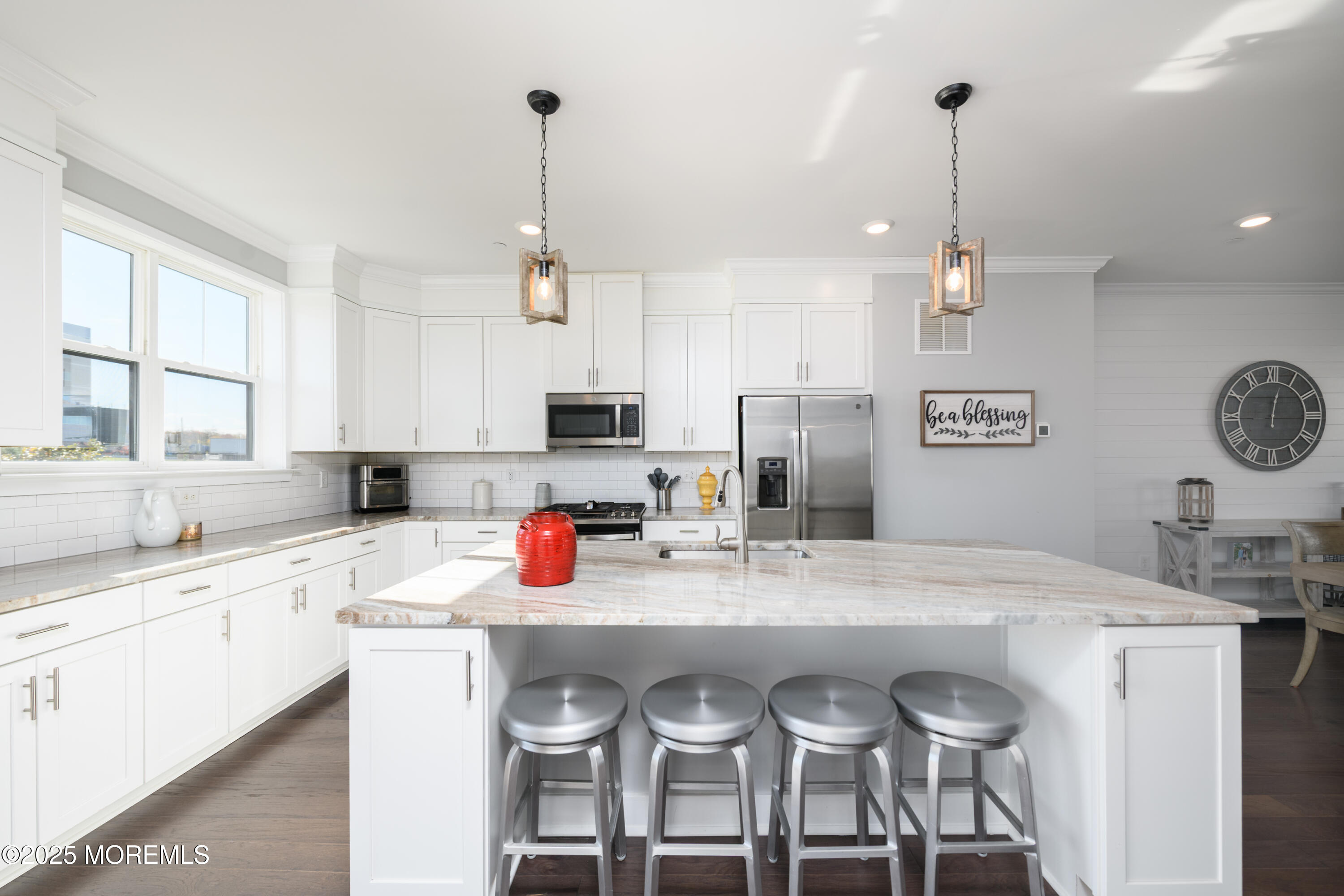 26 Kelly Way Tinton Falls, NJ 07724 - Photo 10 of 33 a open kitchen with stainless steel appliances granite countertop a sink a stove a refrigerator and chairs