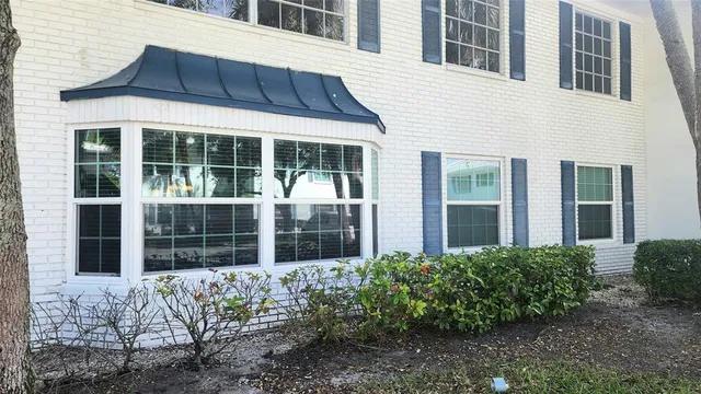 a view of a house with a garden