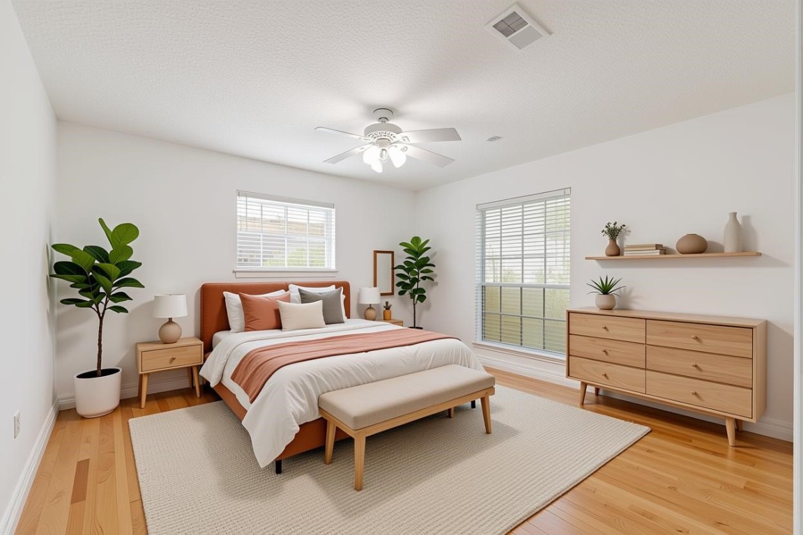 9208 Carousel Lane Houston, TX 77080 - Photo 14 of 31 a bedroom with a bed and a chandelier