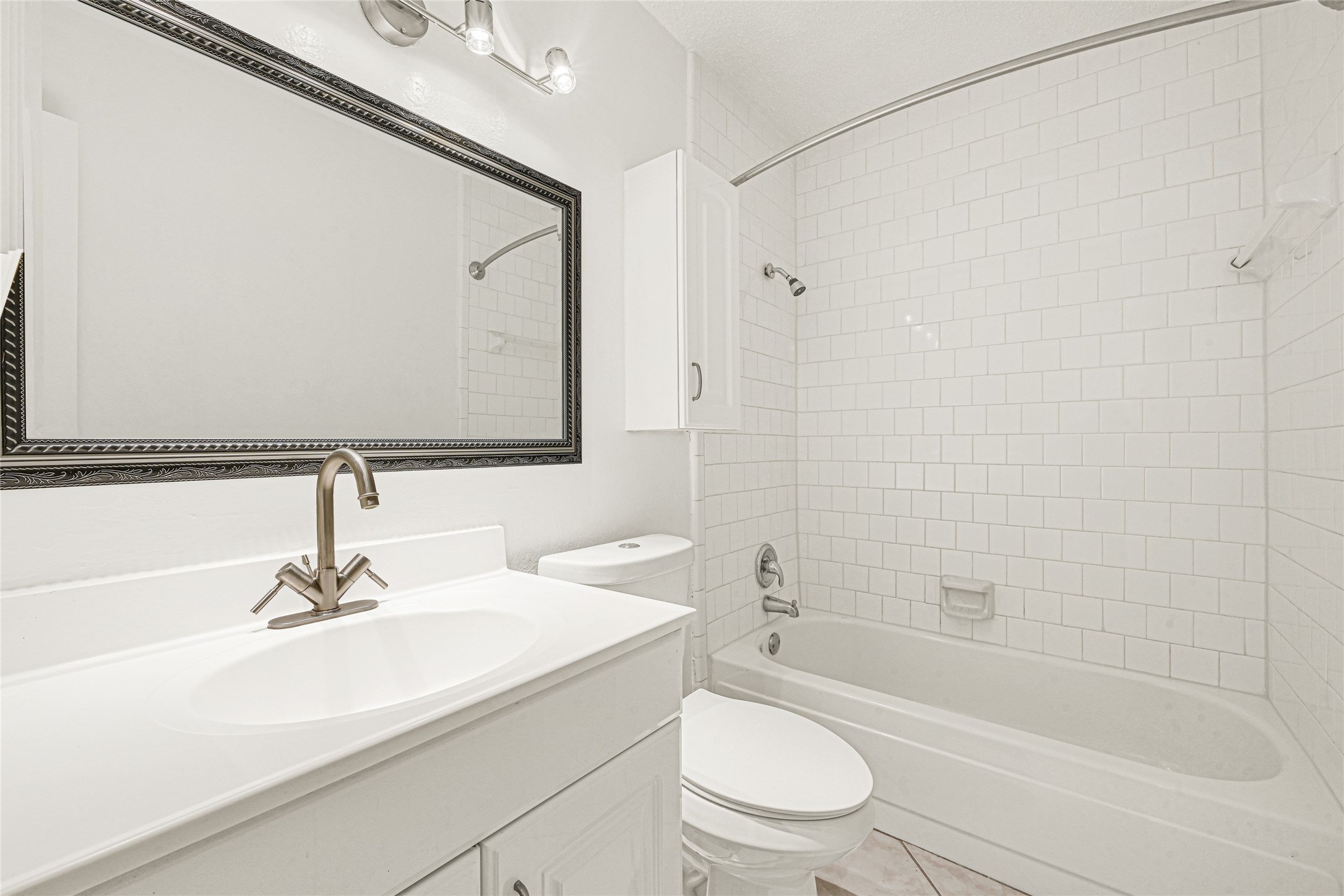 9208 Carousel Lane Houston, TX 77080 - Photo 15 of 31 a bathroom with a sink a toilet and shower