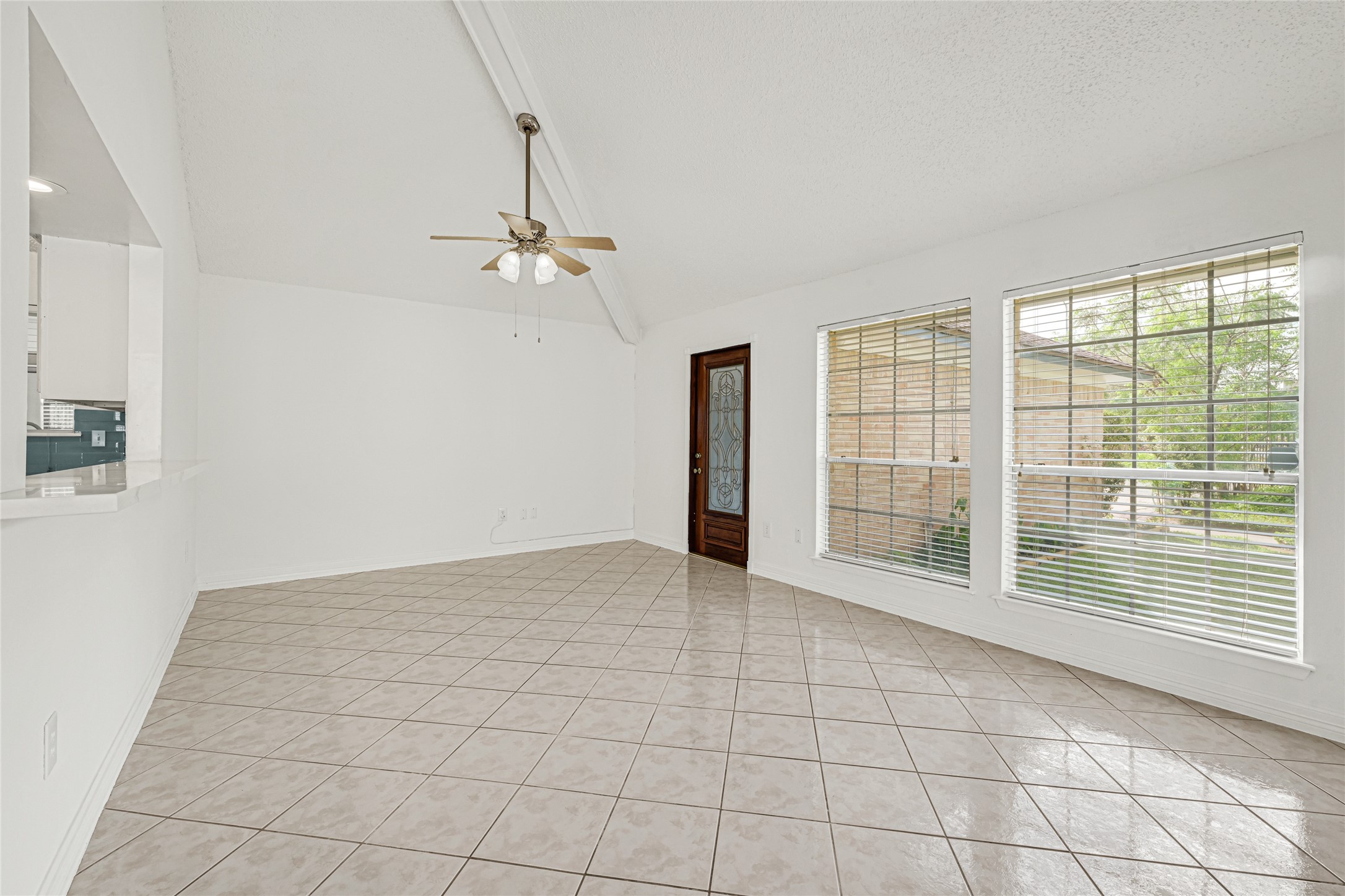 9208 Carousel Lane Houston, TX 77080 - Photo 22 of 31 a view of an empty room with a window