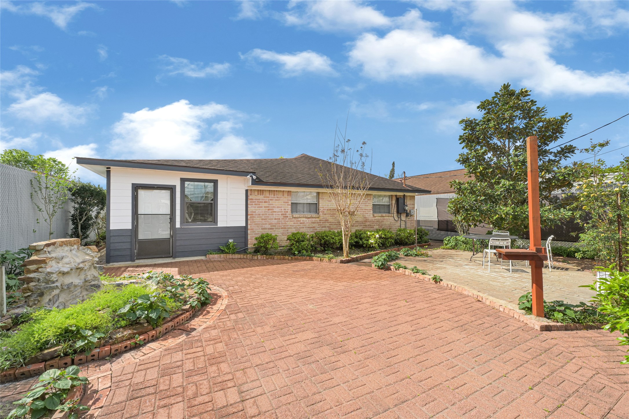 9208 Carousel Lane Houston, TX 77080 - Photo 29 of 31 a front view of a house with a yard and a garage