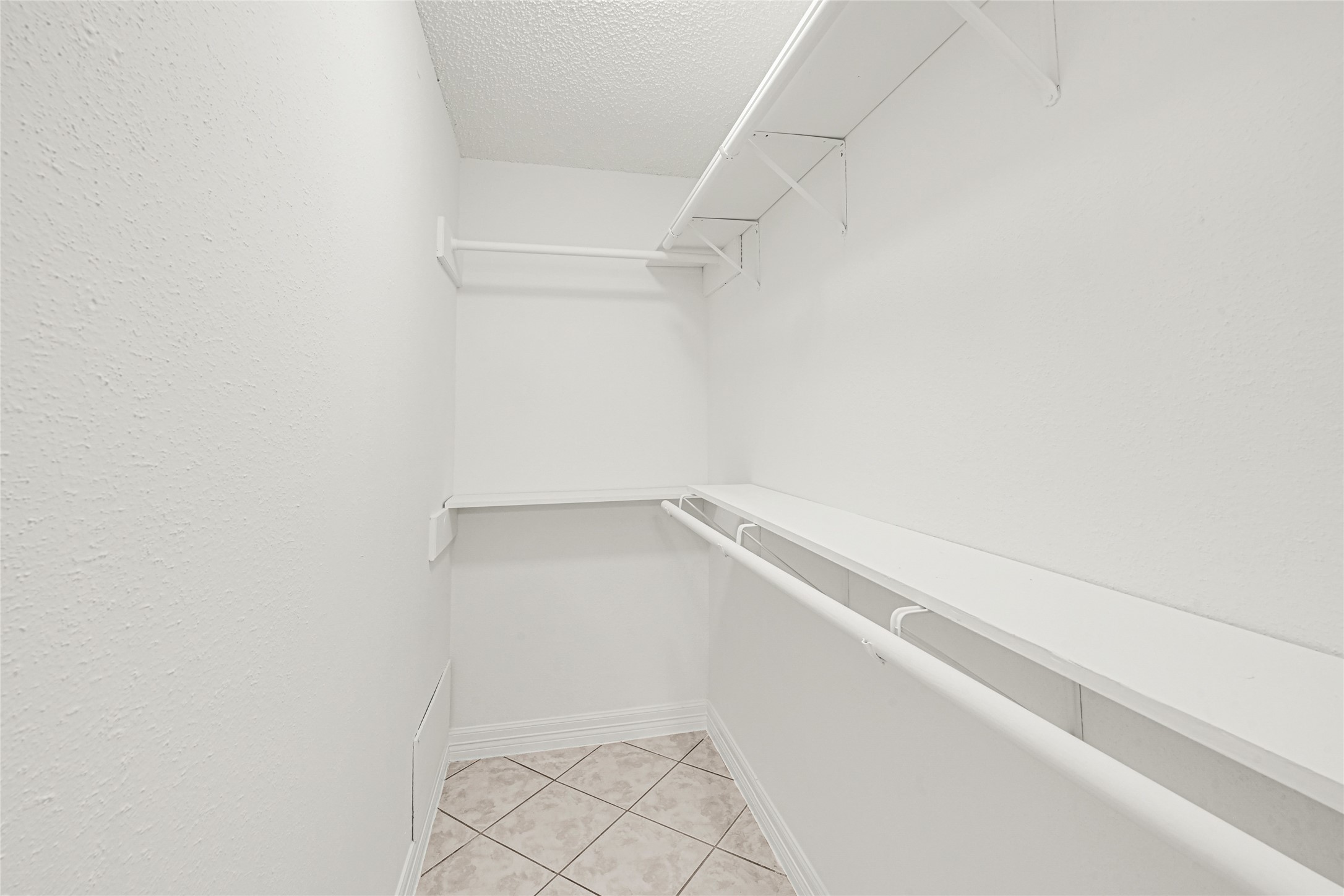 9208 Carousel Lane Houston, TX 77080 - Photo 9 of 31 a view of an empty walk in closet