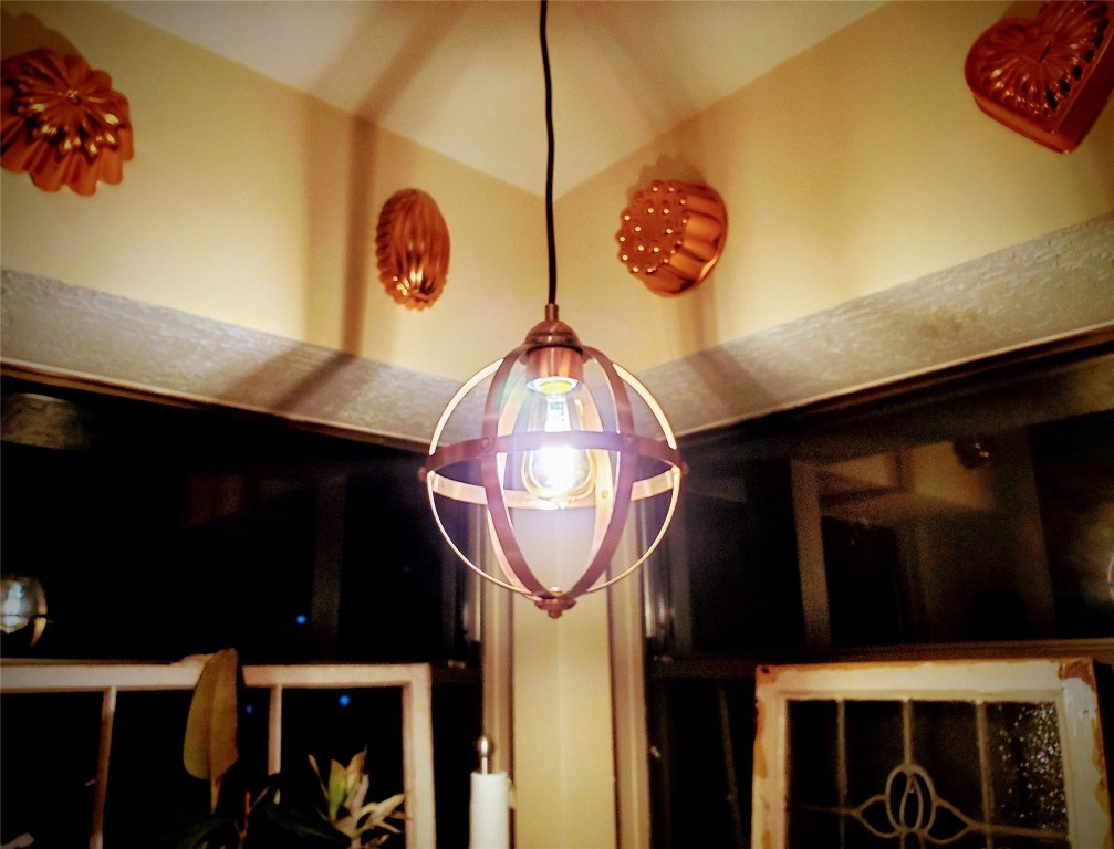 14834 La Rana Drive Houston, TX 77083 - Photo 12 of 14 Cozy nook with industrial pendant light and warm, inviting décor.