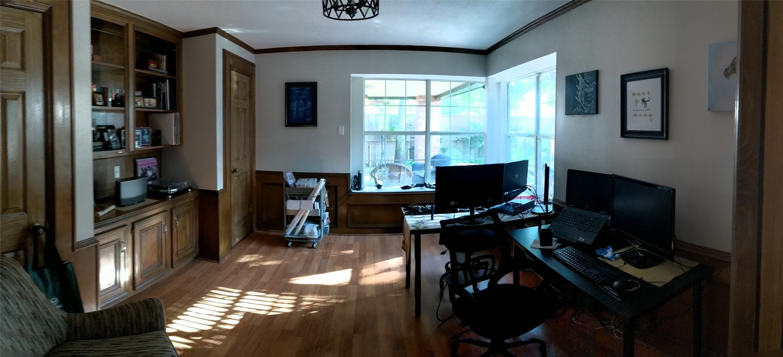 14834 La Rana Drive Houston, TX 77083 - Photo 3 of 14 a view of a workspace with furniture and a fireplace