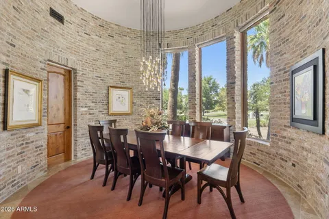 a kitchen with stainless steel appliances granite countertop a stove and a refrigerator
