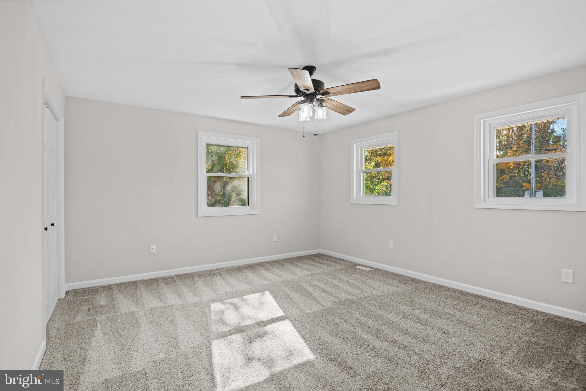15388 Point Lookout Road St. Inigoes, MD 20684 - Photo 14 of 29 a view of empty room with windows
