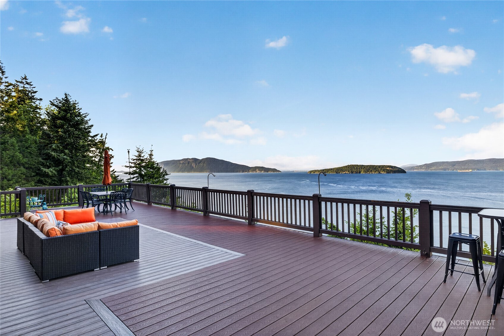 4623 Guemes Island Road Anacortes, WA 98221 - Photo 26 of 40 a outdoor sitting area with furniture and wooden floor