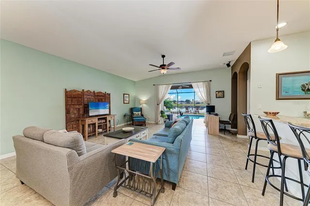 a dining room with furniture and window