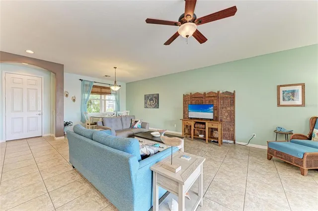 a view of a dining room with furniture and windows