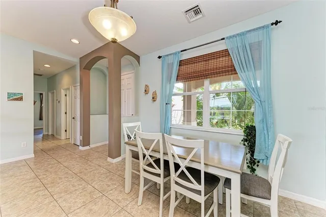 a view of a dining room with furniture