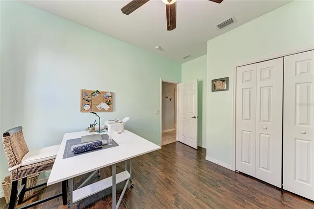 a view of a swimming pool with a patio