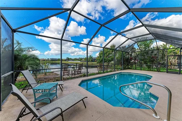 a view of a two chairs in the park