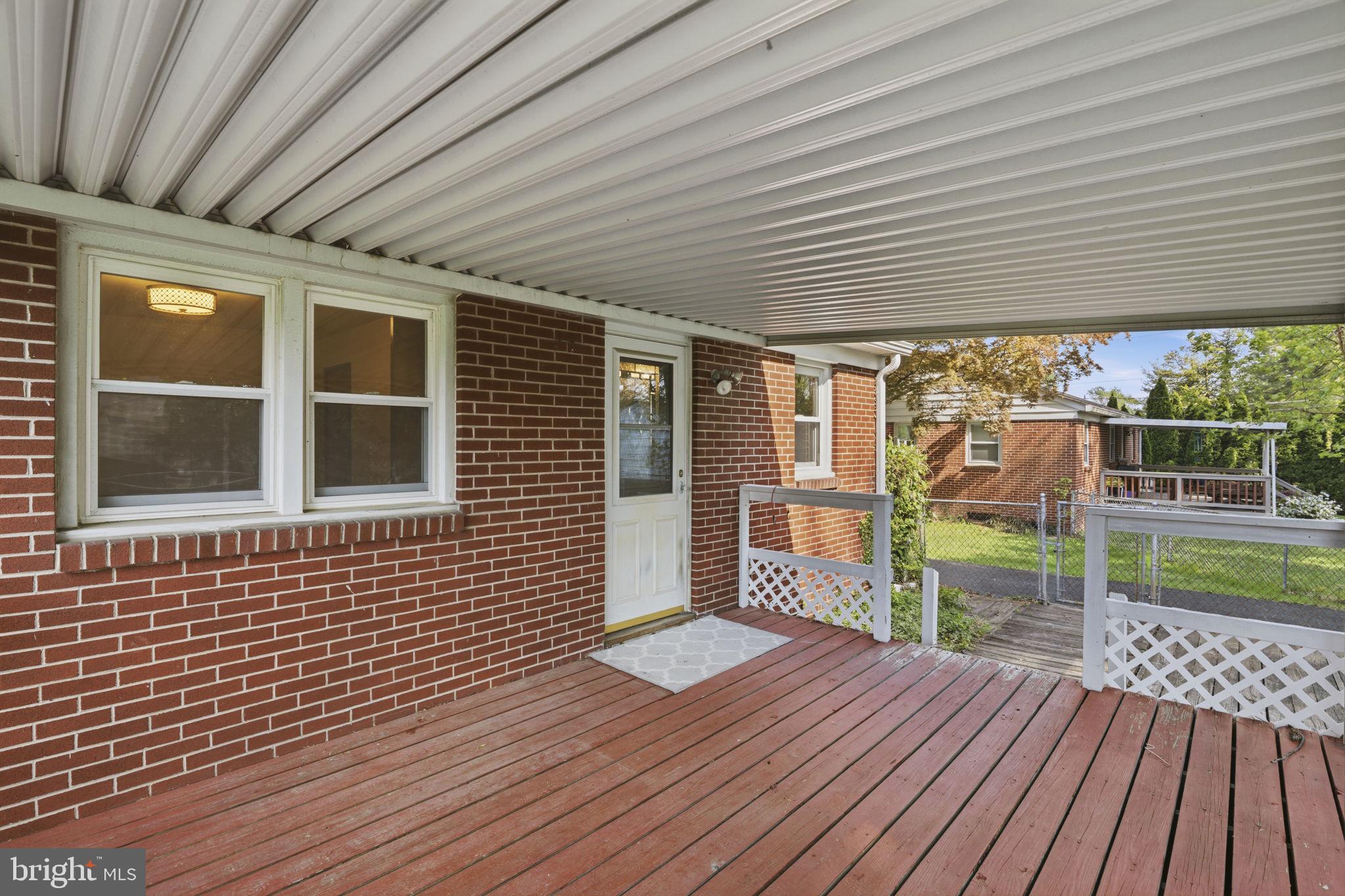 4 Brooks Road Bel Air, MD 21014 - Photo 14 of 21 Covered rear porch the kitchen