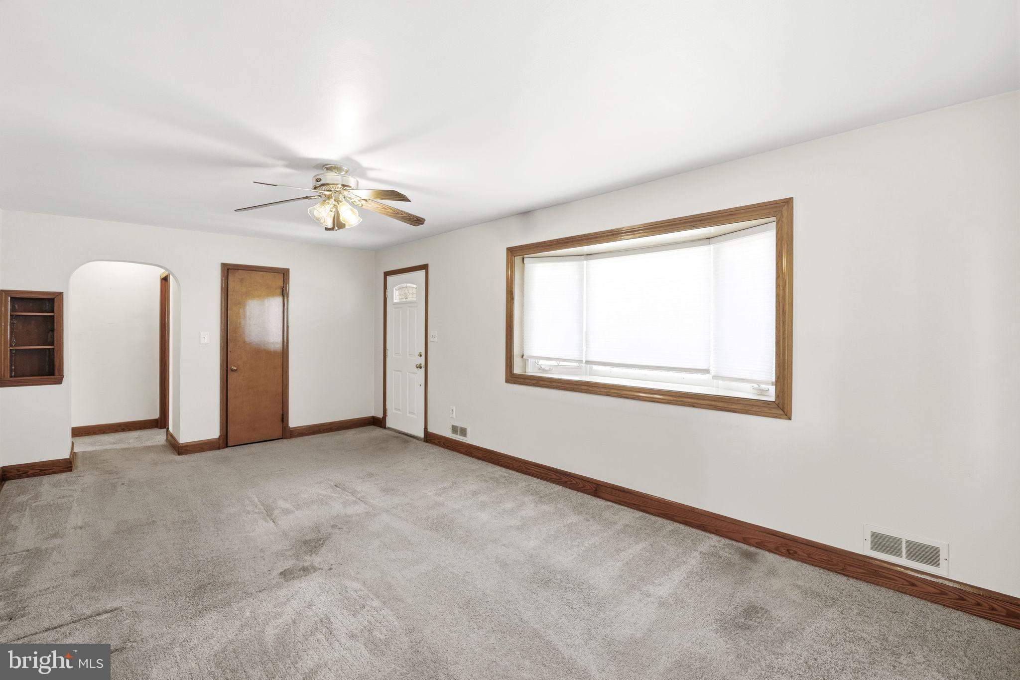 4 Brooks Road Bel Air, MD 21014 - Photo 3 of 21 Living room w/carpet & ceiling fan
