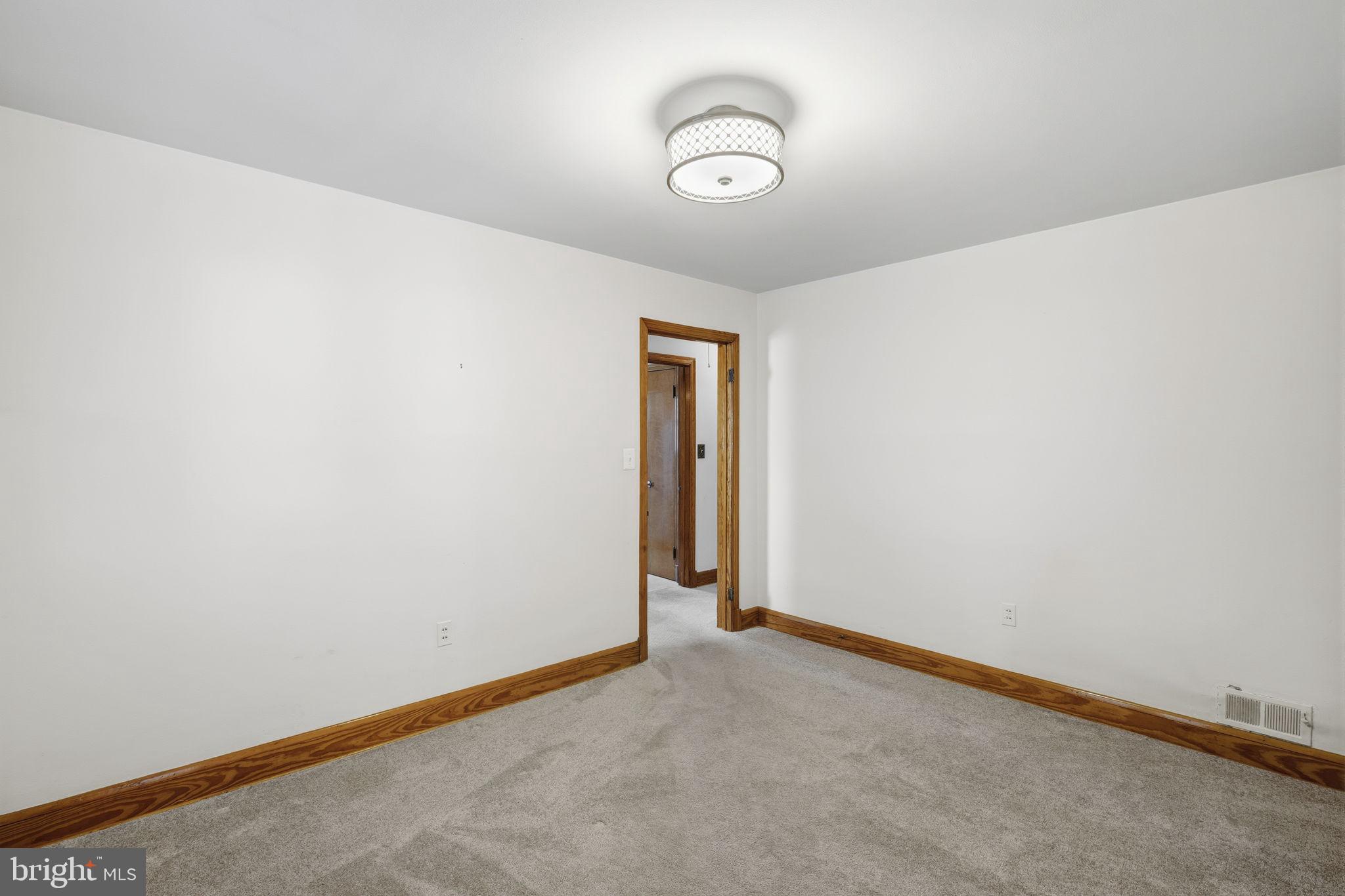 4 Brooks Road Bel Air, MD 21014 - Photo 7 of 21 Bedroom 1 with carpet & wood trip