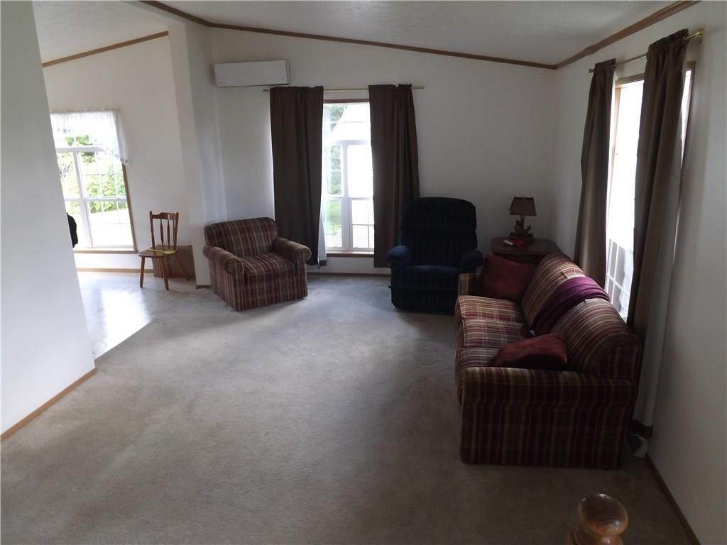 309 Cote Road Limestone, ME 04750 - Photo 6 of 20 Cozy living room with Heat Pump!