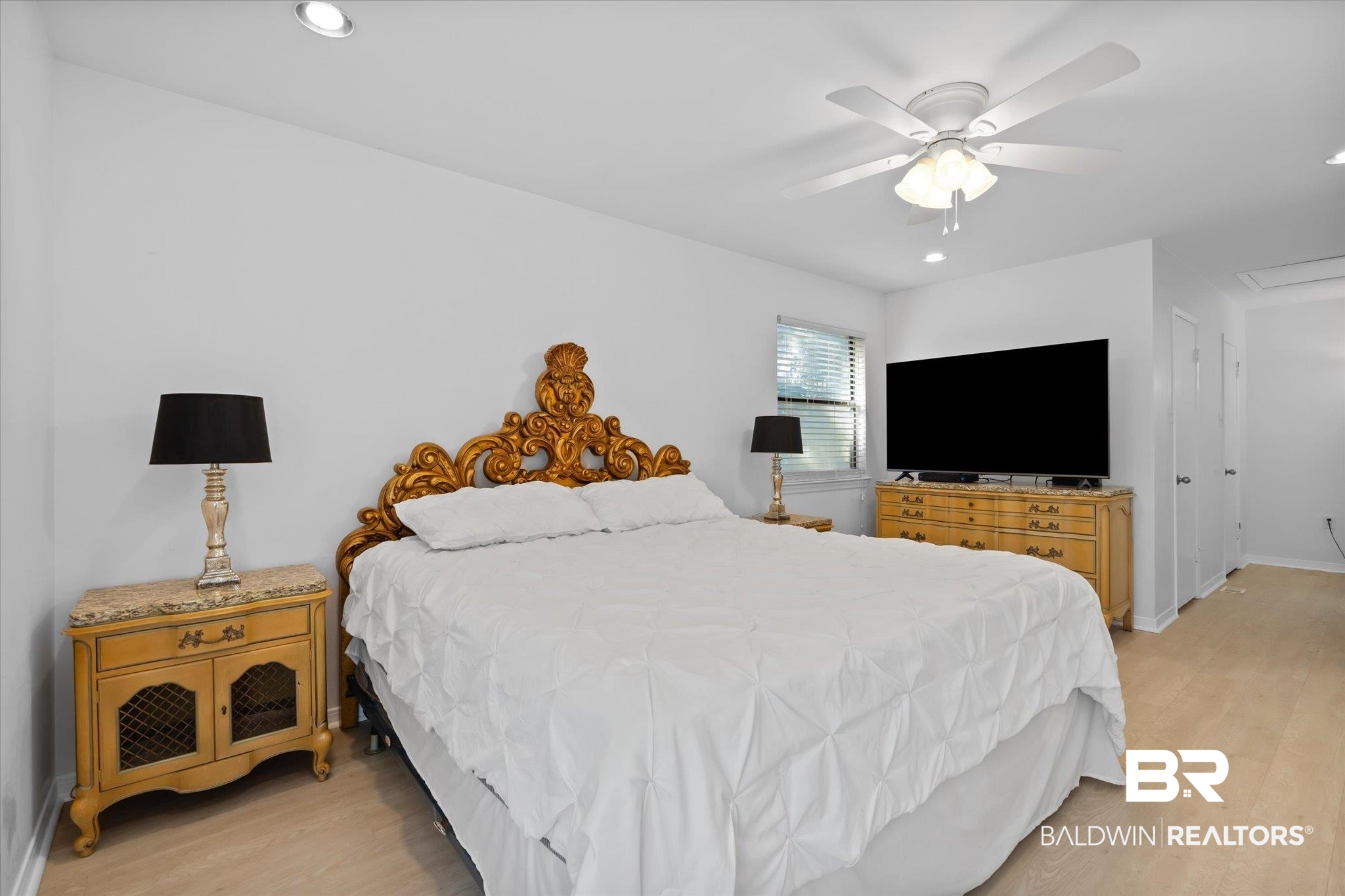 1008 Mcneil Avenue Mobile, AL 36609 - Photo 10 of 20 Bedroom featuring ceiling fan and light hardwood / wood-style flooring