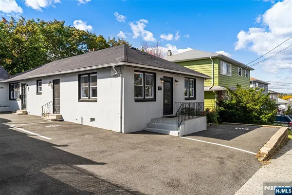 a view of a building with a street