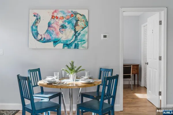 a bedroom with a bed and cupboard