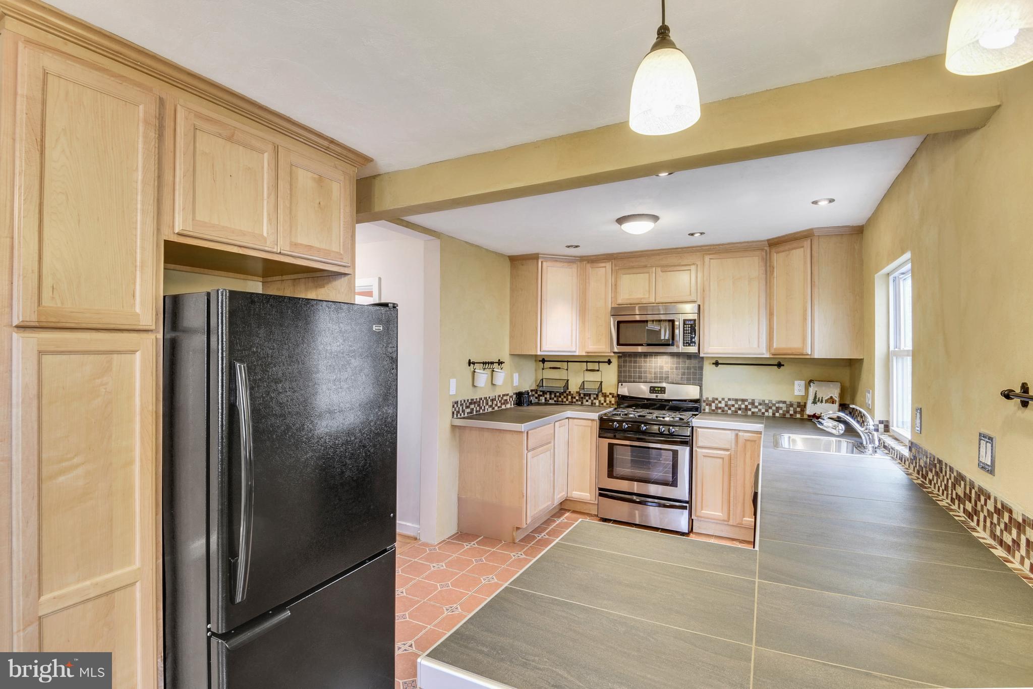 3522 Nimitz Road Kensington, MD 20895 - Photo 9 of 30 Kitchen with New Lighting, New Cabinets