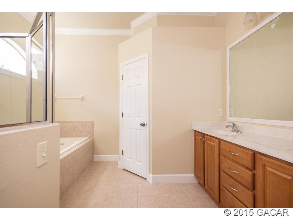 8740 Southwest 25 Road Gainesville, FL 32608 - Photo 15 of 23 Owners Suite Luxury Bath