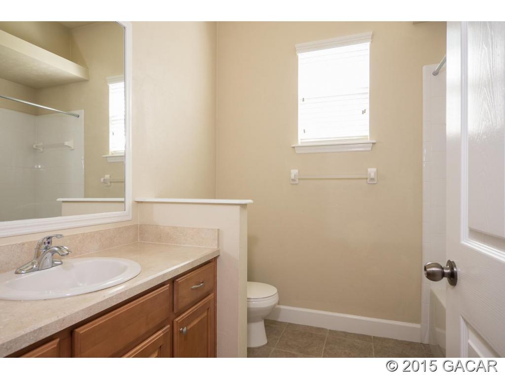 8740 Southwest 25 Road Gainesville, FL 32608 - Photo 17 of 23 Guest Bathroom