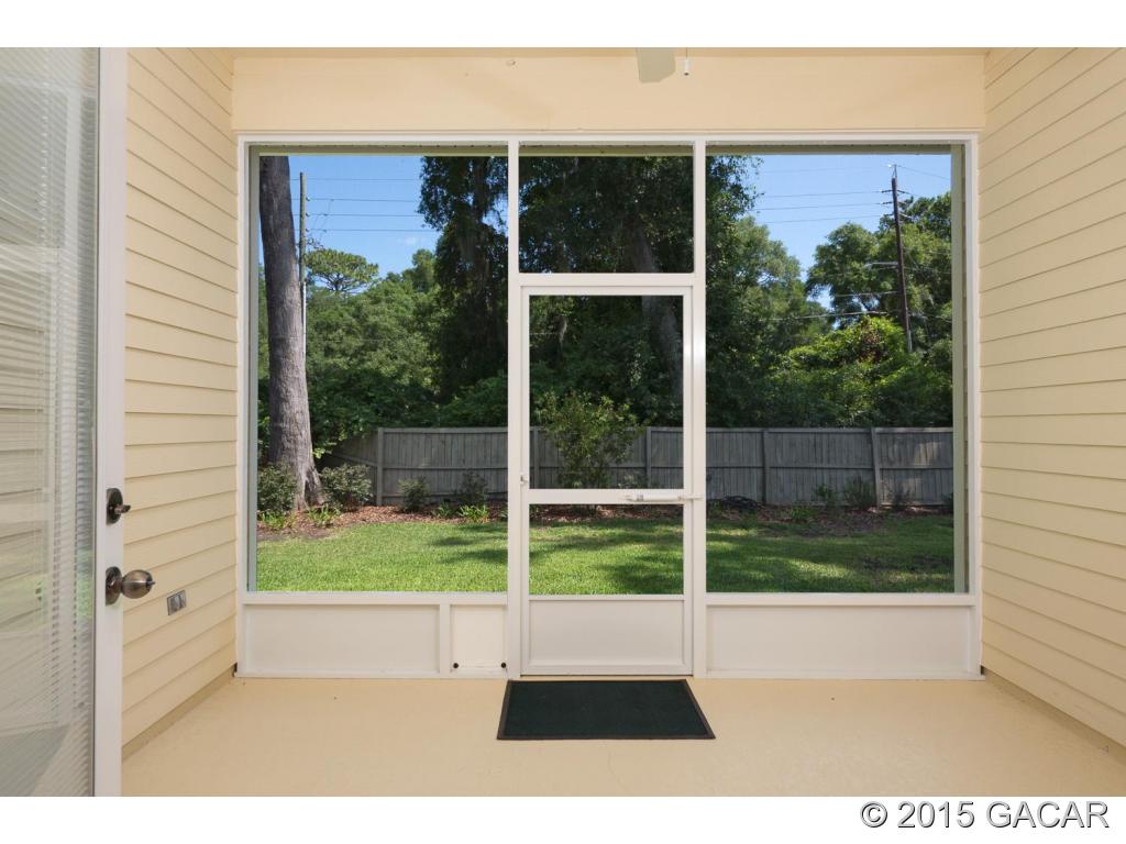 8740 Southwest 25 Road Gainesville, FL 32608 - Photo 19 of 23 Screen porch