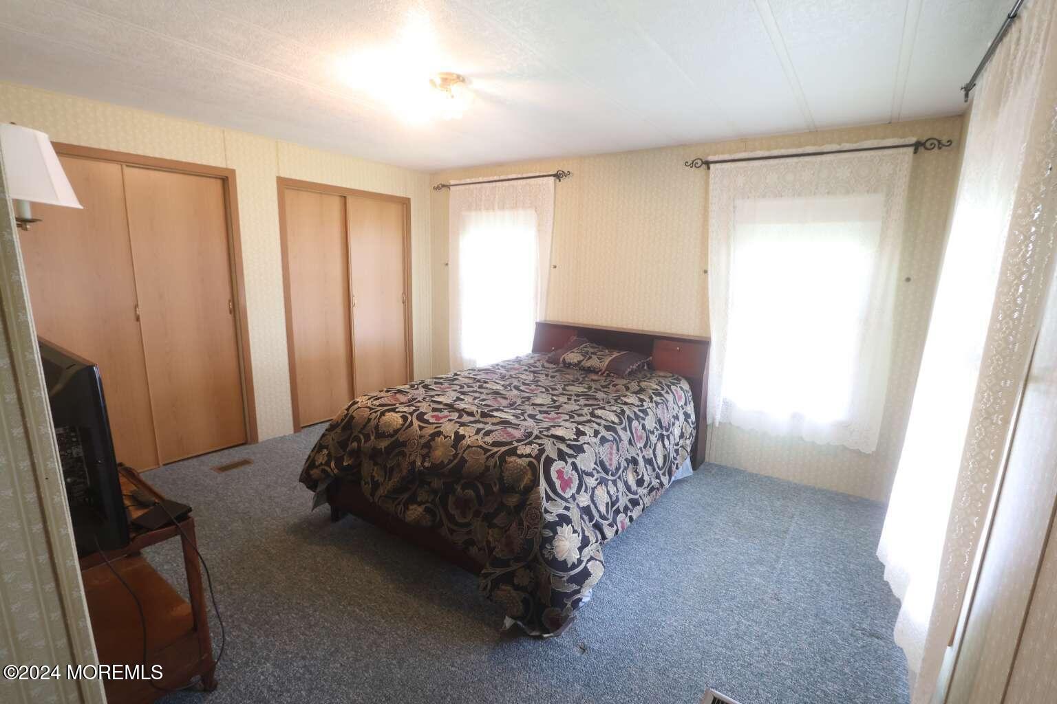 78 Eagle Drive Whiting, NJ 08759 - Photo 19 of 24 a bedroom with a bed and a window