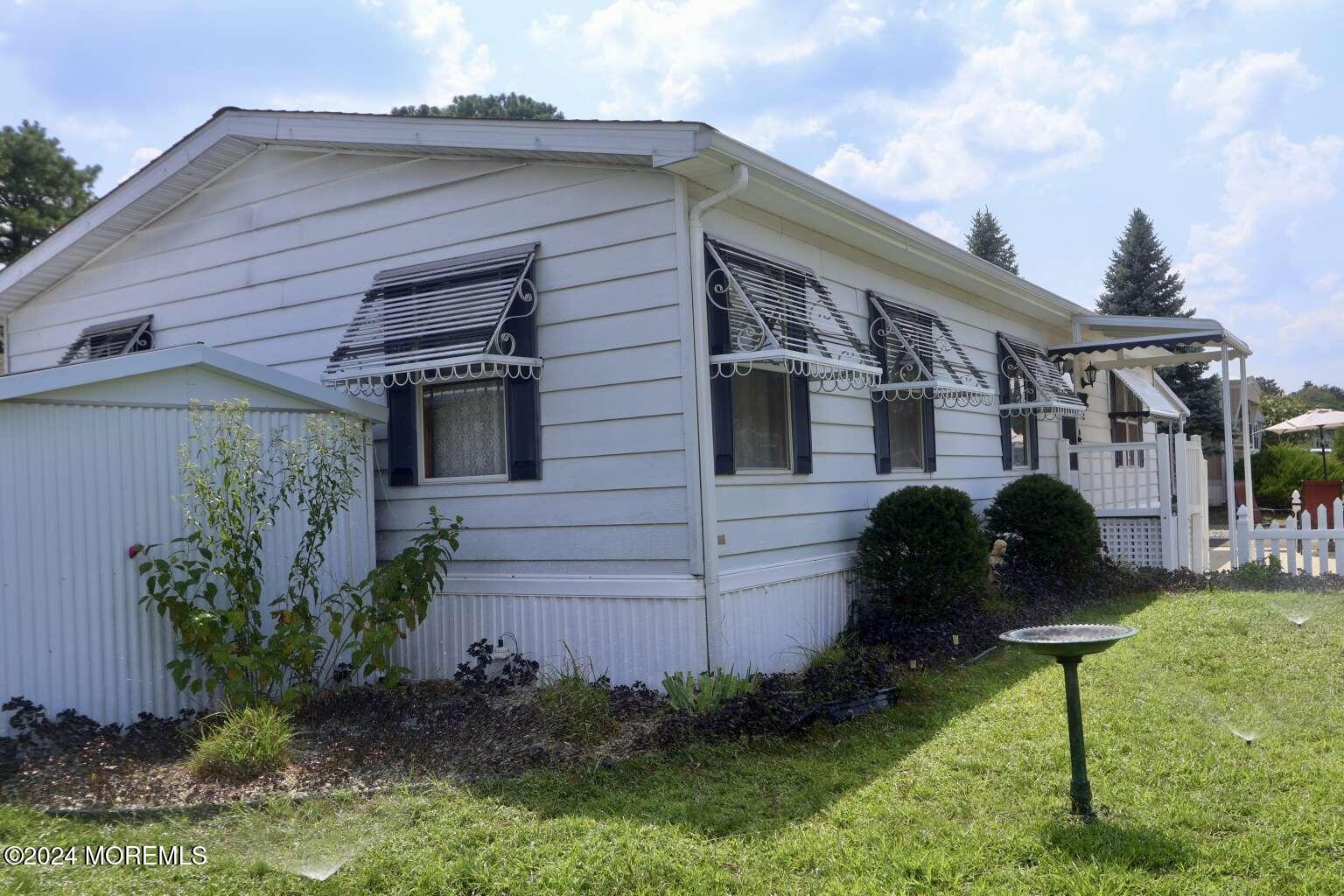 78 Eagle Drive Whiting, NJ 08759 - Photo 3 of 24 a view of a back yard of the house