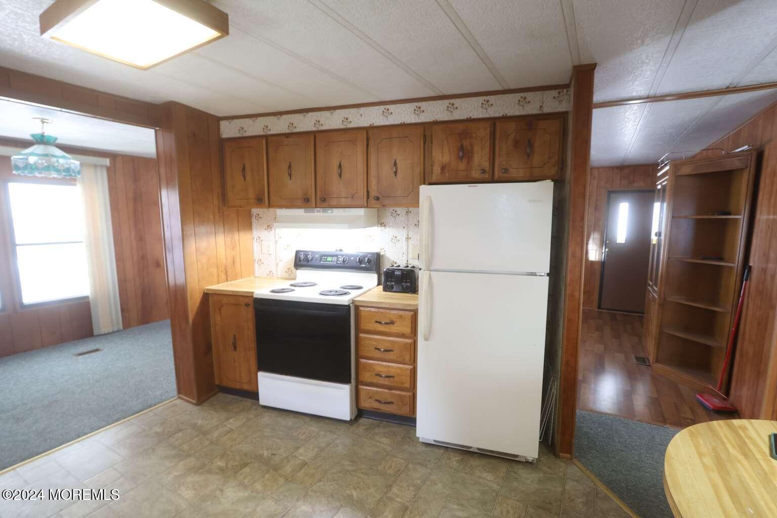 78 Eagle Drive Whiting, NJ 08759 - Photo 7 of 24 a kitchen with stainless steel appliances a refrigerator and a refrigerator