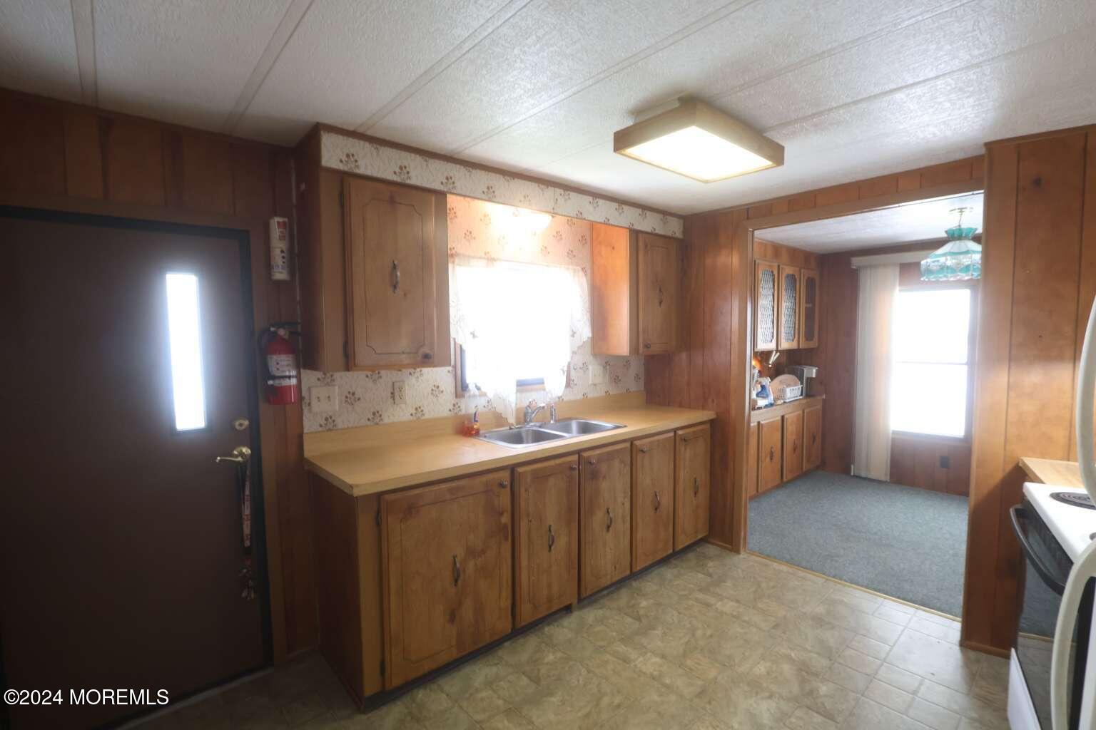 78 Eagle Drive Whiting, NJ 08759 - Photo 8 of 24 a bathroom with a sink a mirror and a bathtub