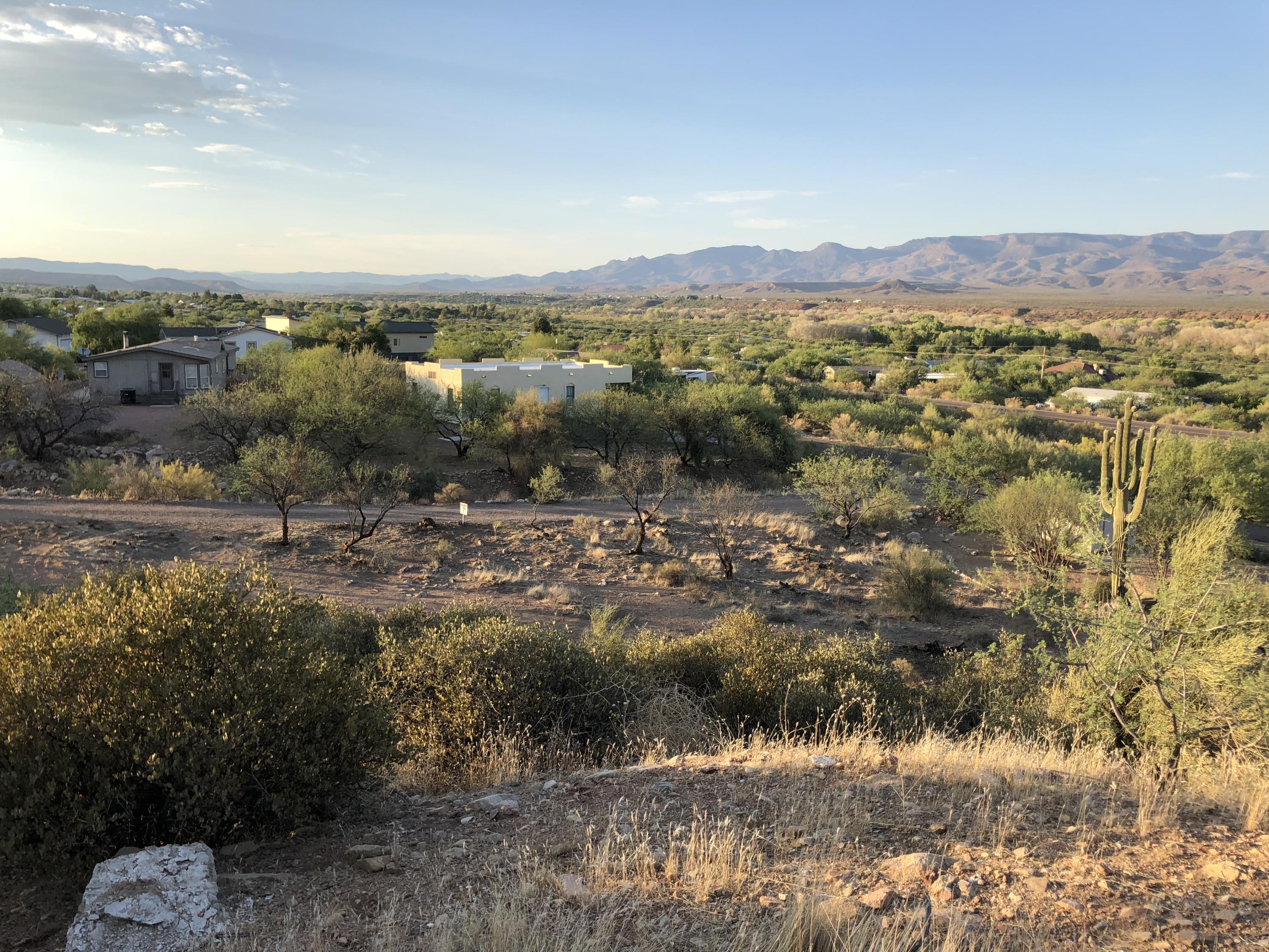 68 Saguaro Road Tonto Basin, AZ 85553 - Photo 2 of 8 a view of a town with mountains in the background