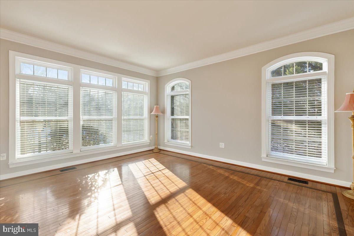 13714 Monet Court Chantilly, VA 20151 - Photo 11 of 58 a view of an empty room with a window