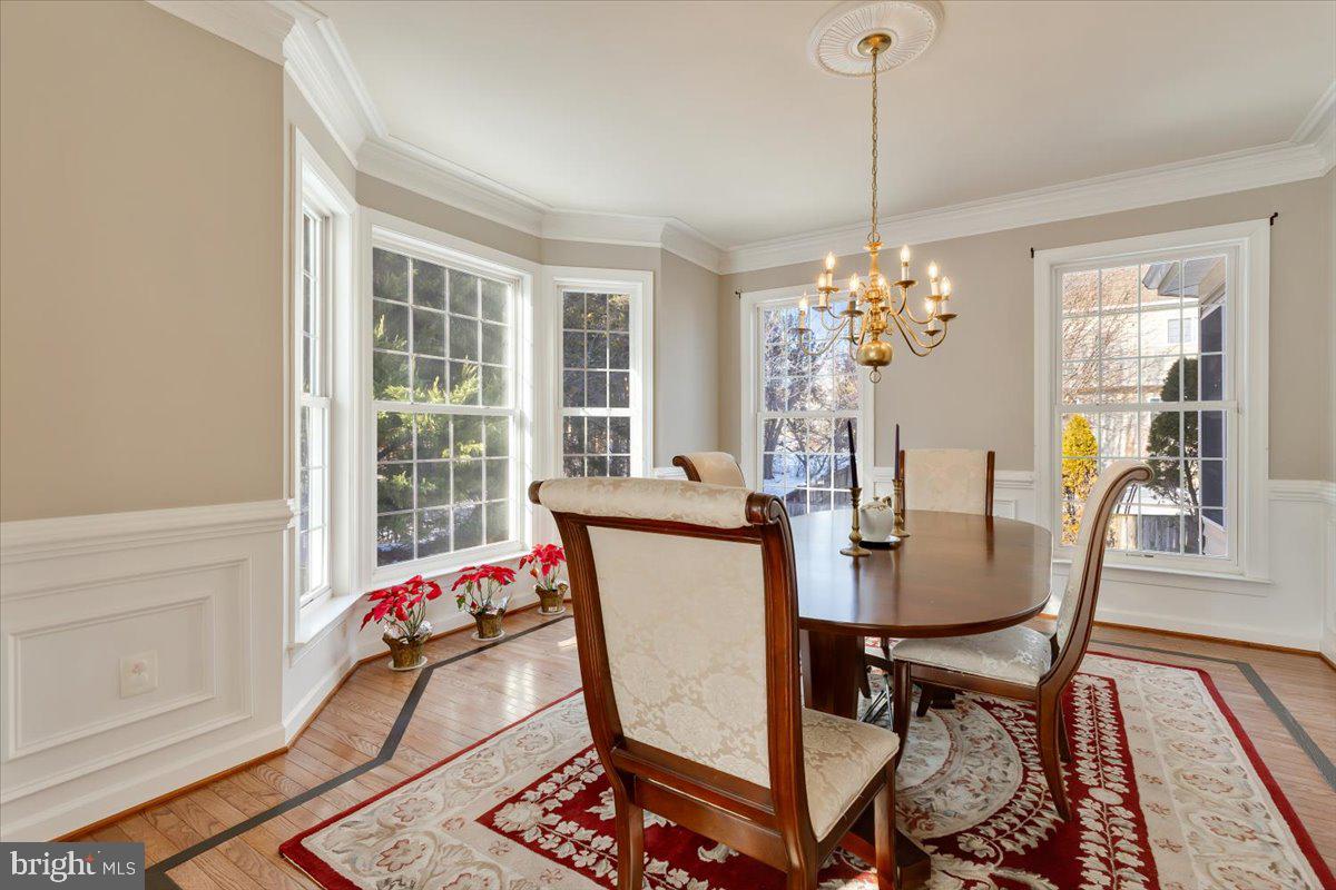 13714 Monet Court Chantilly, VA 20151 - Photo 15 of 58 a view of a dining room with furniture window and outside view