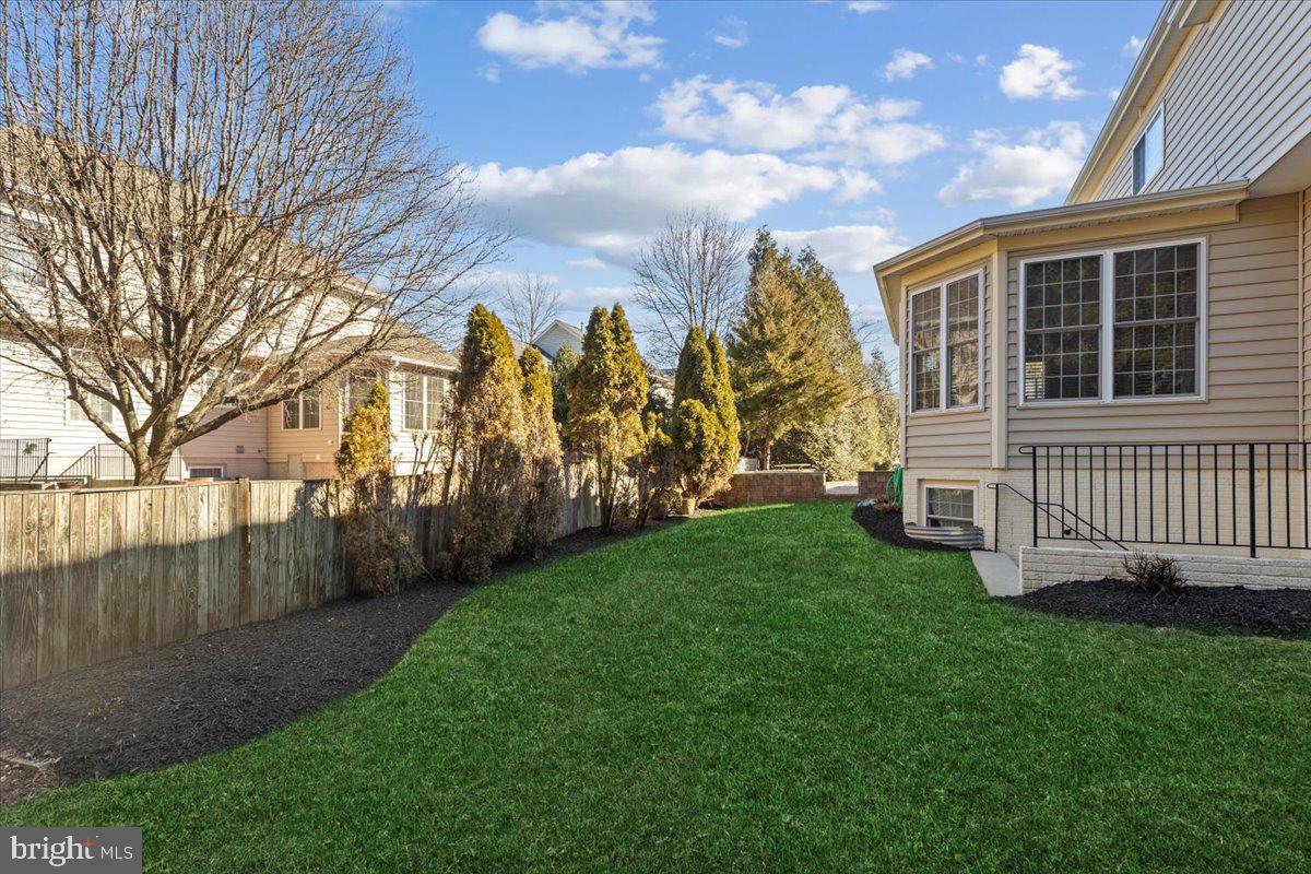 13714 Monet Court Chantilly, VA 20151 - Photo 53 of 58 a view of a house with a yard and pathway