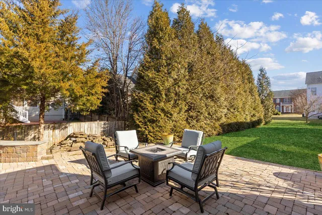 a view of a patio with a yard