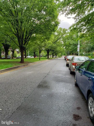 a view of a street with some trees