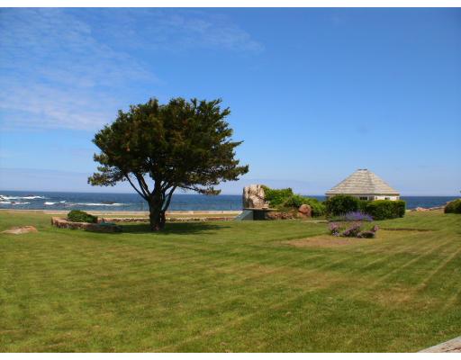214 Atlantic Road Gloucester, MA 01930 - Photo 6 of 30 a swimming pool is in a garden