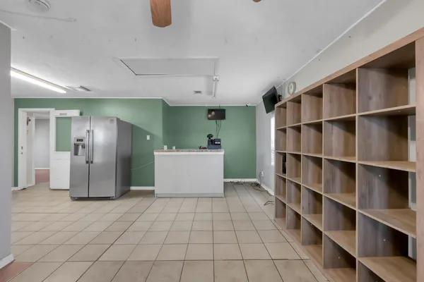 a bathroom with a shower and a toilet