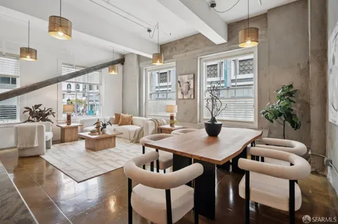a view of a livingroom with furniture and window