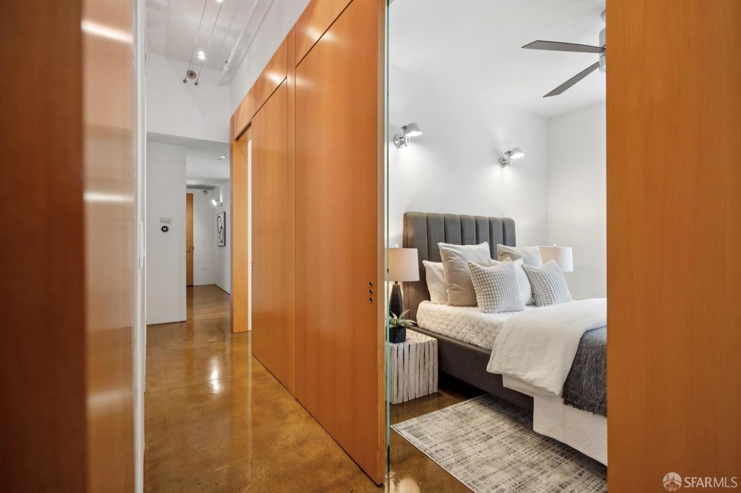 2 Mint Plaza, Unit 201 San Francisco, CA 94103 - Photo 17 of 40 a bedroom with a bed and a couch