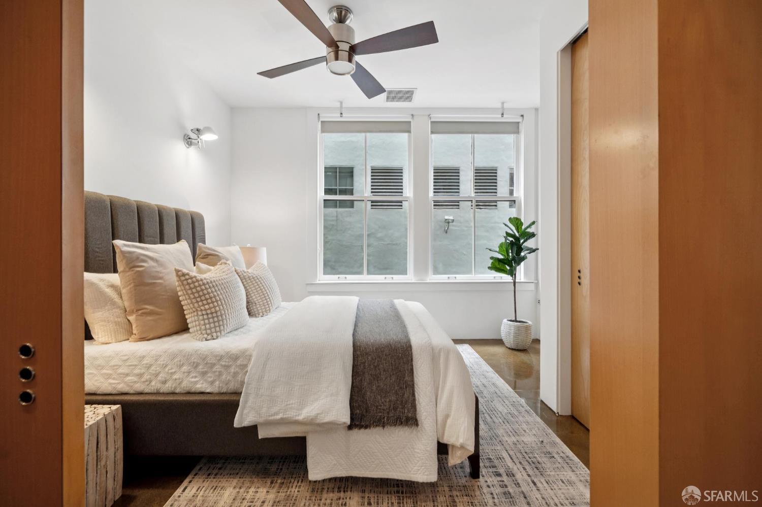 2 Mint Plaza, Unit 201 San Francisco, CA 94103 - Photo 18 of 40 a bed room with a bed and a window