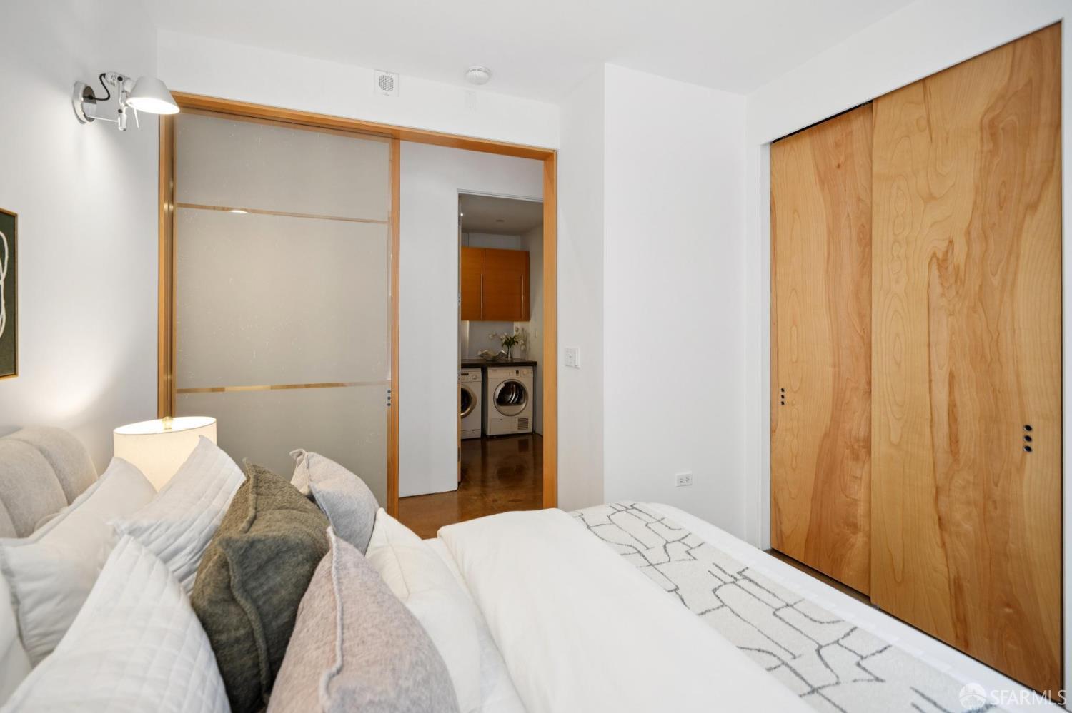 2 Mint Plaza, Unit 201 San Francisco, CA 94103 - Photo 26 of 40 a bedroom with a bed and a curtain