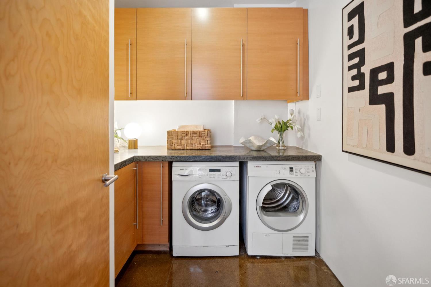 2 Mint Plaza, Unit 201 San Francisco, CA 94103 - Photo 27 of 40 a utility room with dryer and washer
