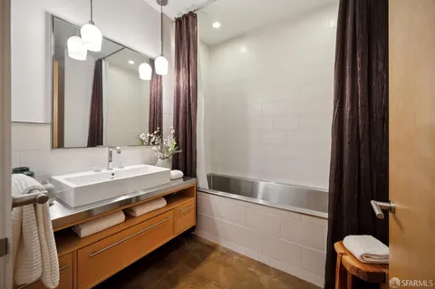 a bathroom with a sink and a bathtub