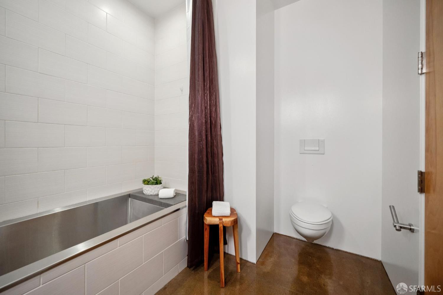 2 Mint Plaza, Unit 201 San Francisco, CA 94103 - Photo 30 of 40 a bathroom with a sink and a bathtub