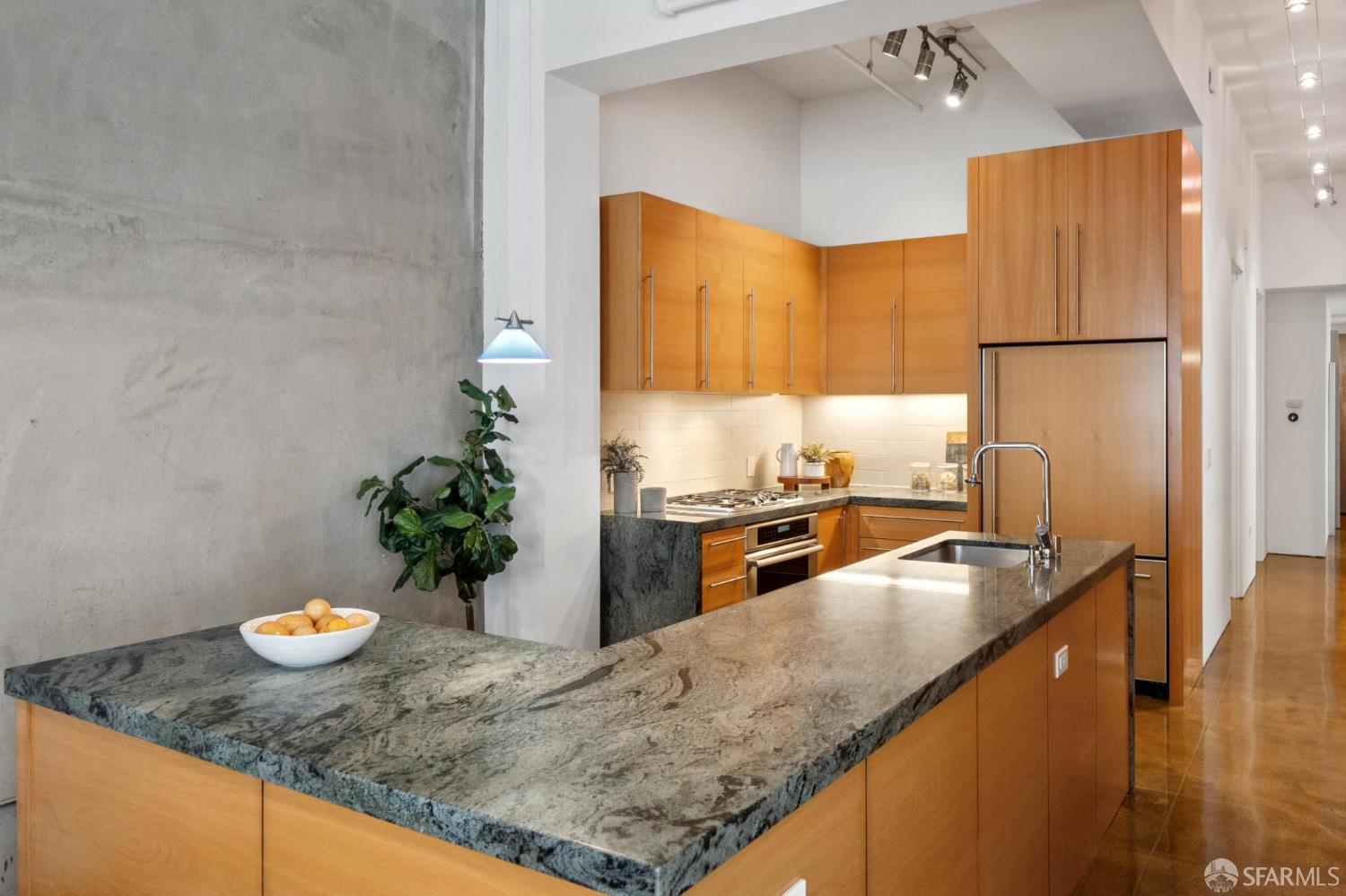 2 Mint Plaza, Unit 201 San Francisco, CA 94103 - Photo 8 of 40 a kitchen with stainless steel appliances granite countertop sink stove and refrigerator